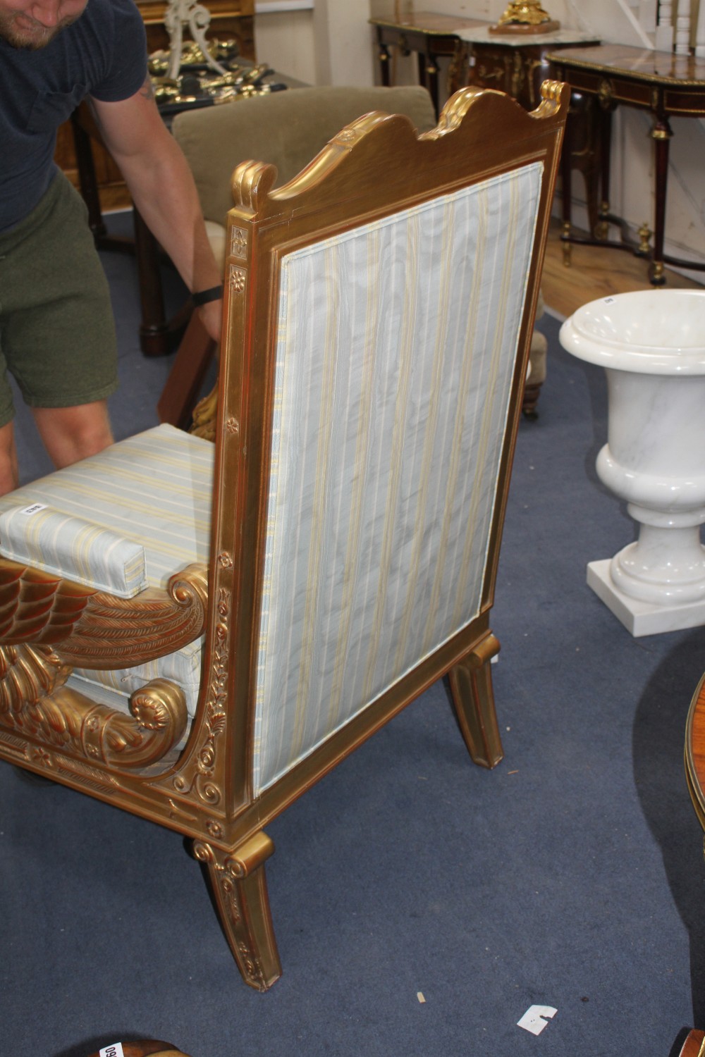 A French Empire carved giltwood armchair, W.76cm D.76cm H.116cm